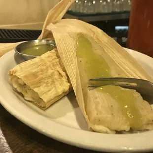 Chicken tamales with green salsa.