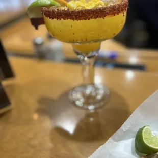 House mango margarita with tajin rim
