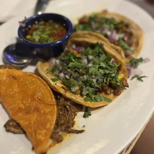 Birria and al pastor tacos