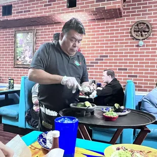 a man serving food