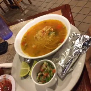 Caldo de Pollo is their cauldron of chicken soup! Came with a pico de gallo perfectly laced with cilantro, as well as limes &amp; tortillas.