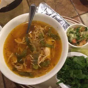 Caldo de Pollo - Chicken Soup. I had then add the cilantro, and bought a side of sliced avocados!!