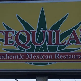 a sign for tequila's authentic mexican restaurant