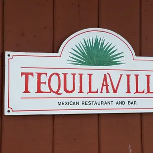 a sign for tequilaville mexican restaurant and bar