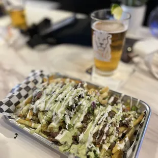 Birria fries and a Modelo