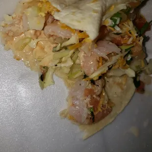 Undercooked shrimp taco