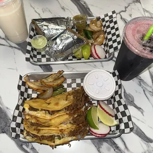 Quesabirrias, carne asada burrito and water de horchata and Jamaica