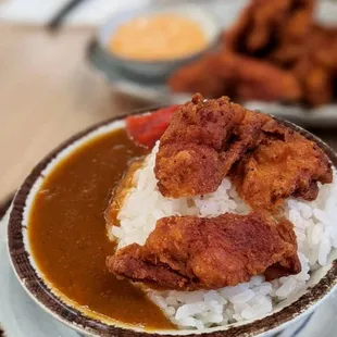 a plate of rice and meat