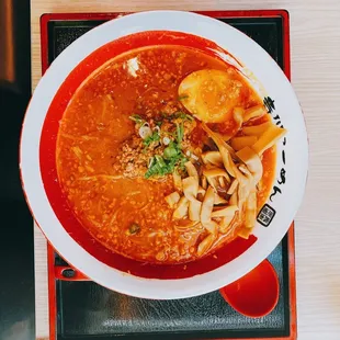 a bowl of ramen on a table