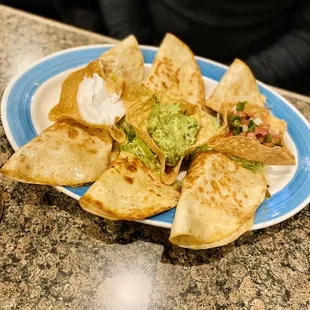 a plate of quesadillas
