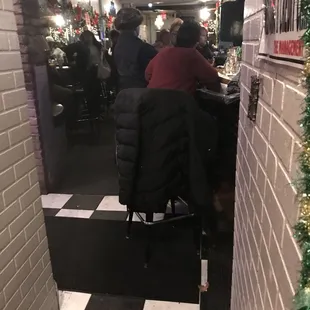 people sitting at the bar