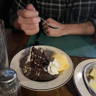 a man eating a piece of cake