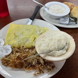 Sausage and tomato omelet, grits, hash browns, and biscuits with gravy. Awesome!