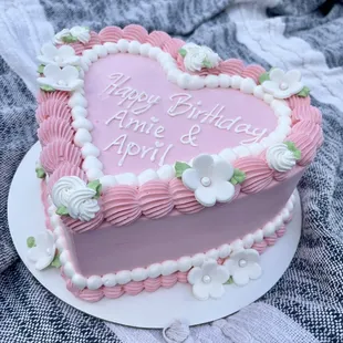 a heart shaped birthday cake