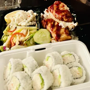 Teriyaki Salmon Plate w/ salad, macaroni salad, and rice. Also, 8 piece California Roll.