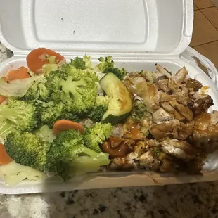 Paid for a container of rice a small scoop of rice and veggies!! 16 bucks for this?? RIP OFF!!