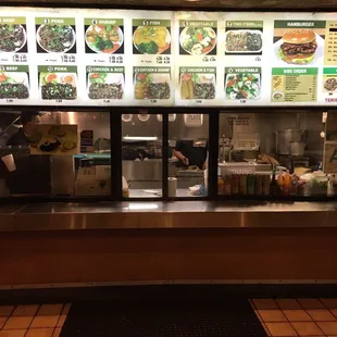 a restaurant counter with menus