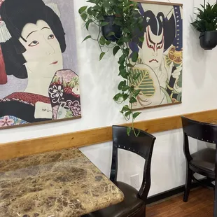 Inside of restaurant with art and plants