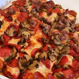 Pepperoni, mushroom, and sausage pizza.