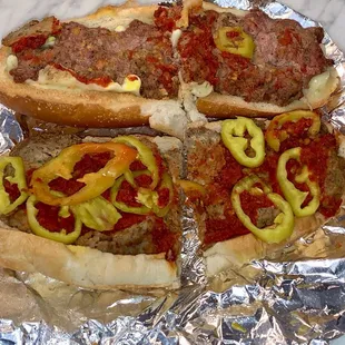 Meatball sub (comes with banana peppers). Couldn&apos;t resist adding the homemade recipe sausage pattie for $3. #UpCloseSavor
