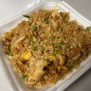 Pineapple friend rice mild with chicken. Get a side of coconut curry sauce for it!