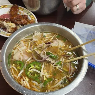 Large Pho Beef Broth, added sriracha and chili oil and all the fixins