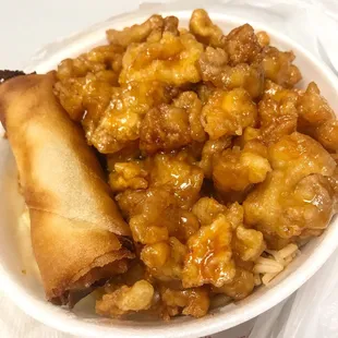 Orange chicken bowl with egg roll. YUM.