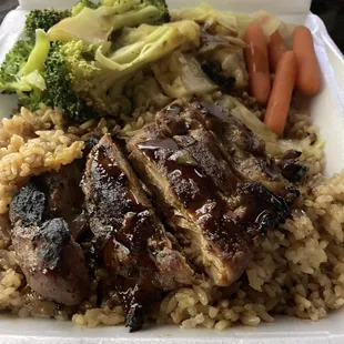 Teriyaki chicken with fried rice, steamed broccoli, and carrots
