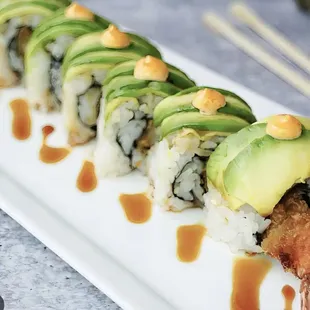 Green Dragon with shrimp tempura, cucumber, crab, topped with avocado, spicy mayo &amp; unagi sauce!
