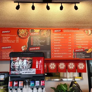 The orange menu on the north wall.
