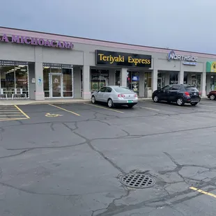 a parking lot with cars parked in it