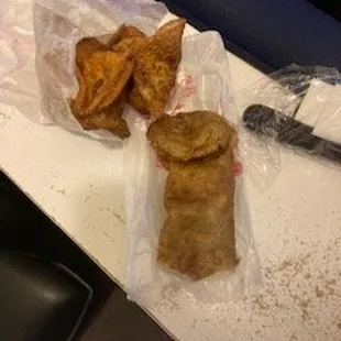 Fried Rangoon and spring roll, but to the trained eye it looks like a deflated.....