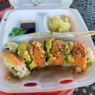 Roll was NOT fresh. Tasted so disgusting. You can also see the texture of the salmon looking funky. The wasabi color also looks too green.
