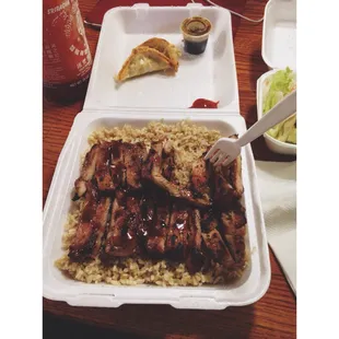 Chicken teriyaki lunch special with sauce on the side and brown rice!