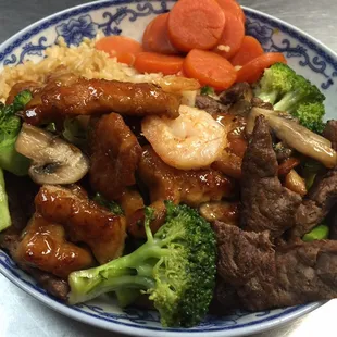 Teriyaki chicken shrimp and steak w. Veggie and rice