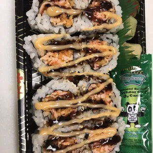 a plate of sushi rolls