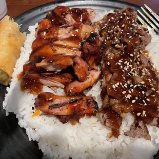 a plate of food with rice and meat