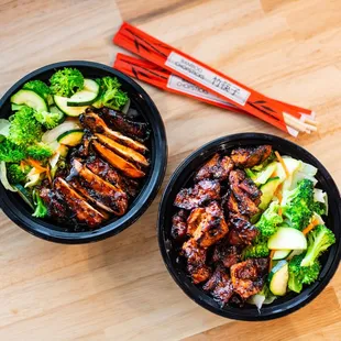 two bowls of chicken and broccoli