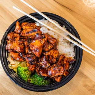 a bowl of chicken and broccoli