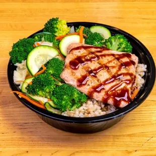 a bowl of rice, broccoli, and chicken