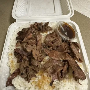 Pork teriyaki with sauce on the side