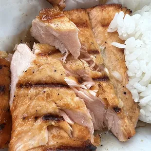 Dry salmon and tasteless orange chicken.