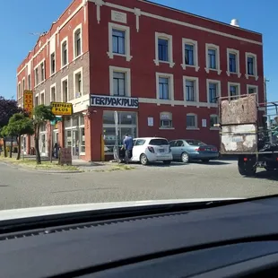 a view of a building from a car