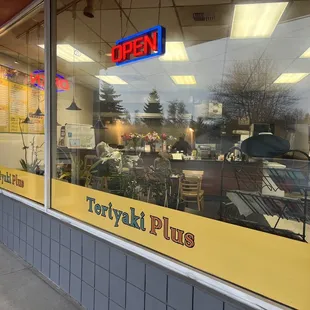 a view of a restaurant through the window