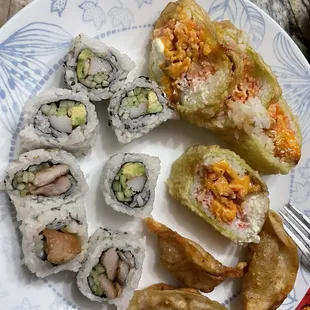 Dumplings, LSU roll, California roll, and chicken teriyaki roll