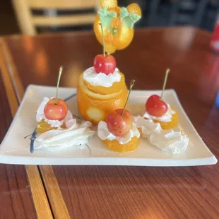 a plate of fruit on a table