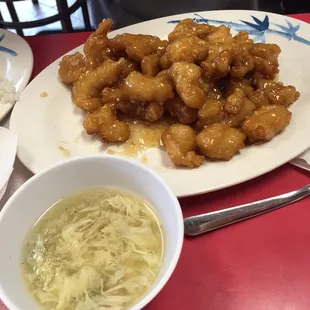 a plate of chicken and noodles