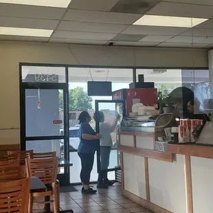 two people in a restaurant