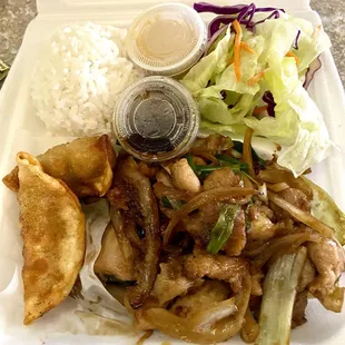 Lunch special Mongolian chicken, gyoza $14.99 comes w/ soup, rice and salad. Good but too many grilled onions.