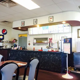 Front counter. Plenty of menu choices on the board above.